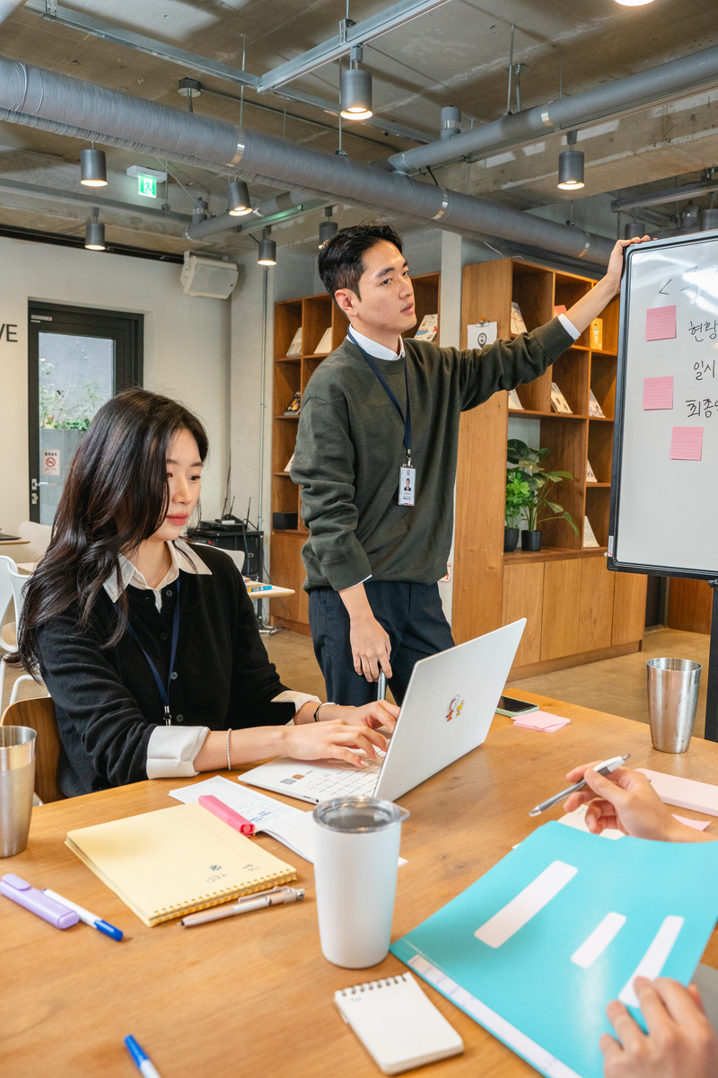 Colleagues at a Whiteboard