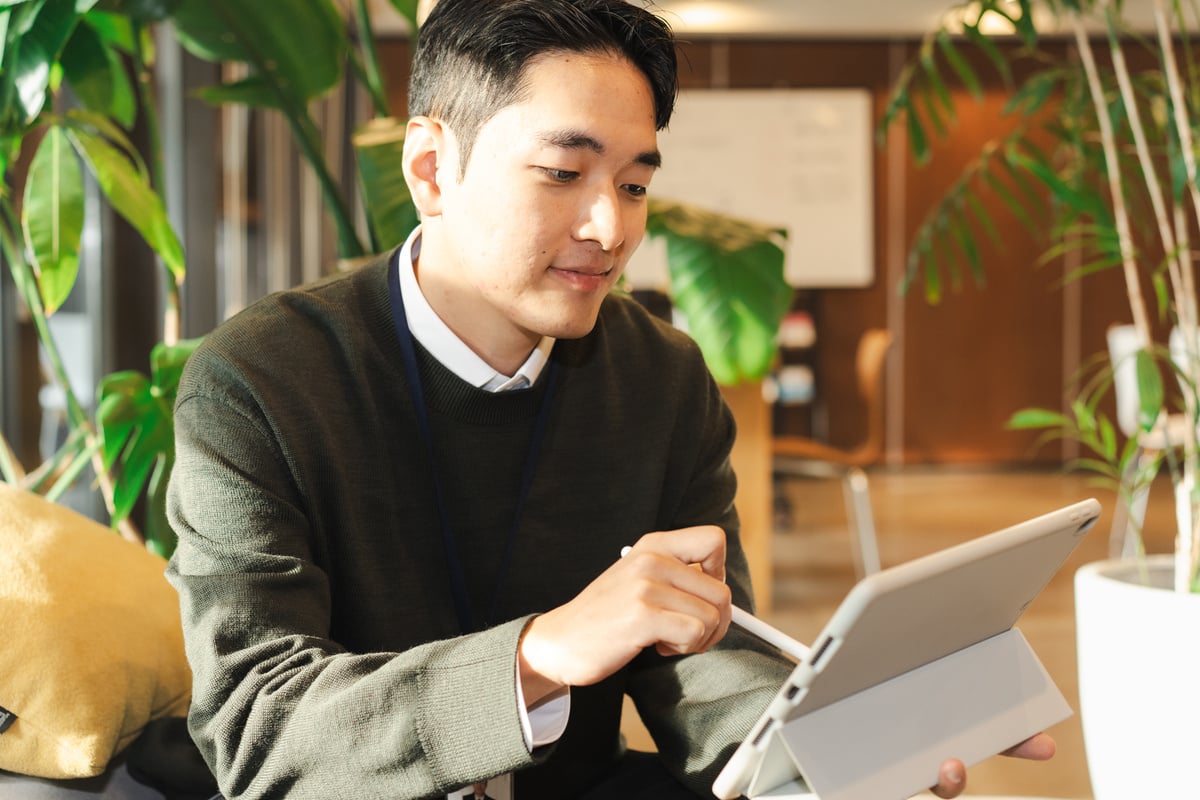 Male Office Worker Using a Tablet